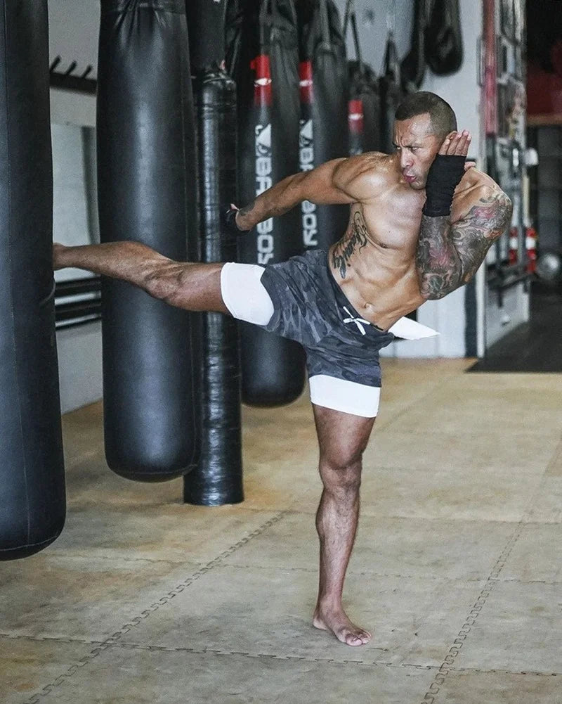 Short de course pour hommes, musculation. Séchage rapide, conçus pour l'entraînement en salle de sport et la course à pied.